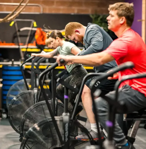 High-intensity conditioning workout on assault bikes